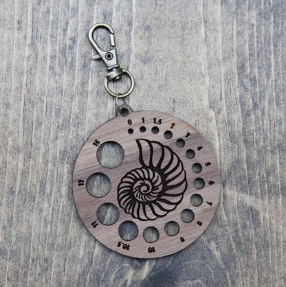 Walnut Nautilus Knitting Needle Gauge & Bronze Clasp